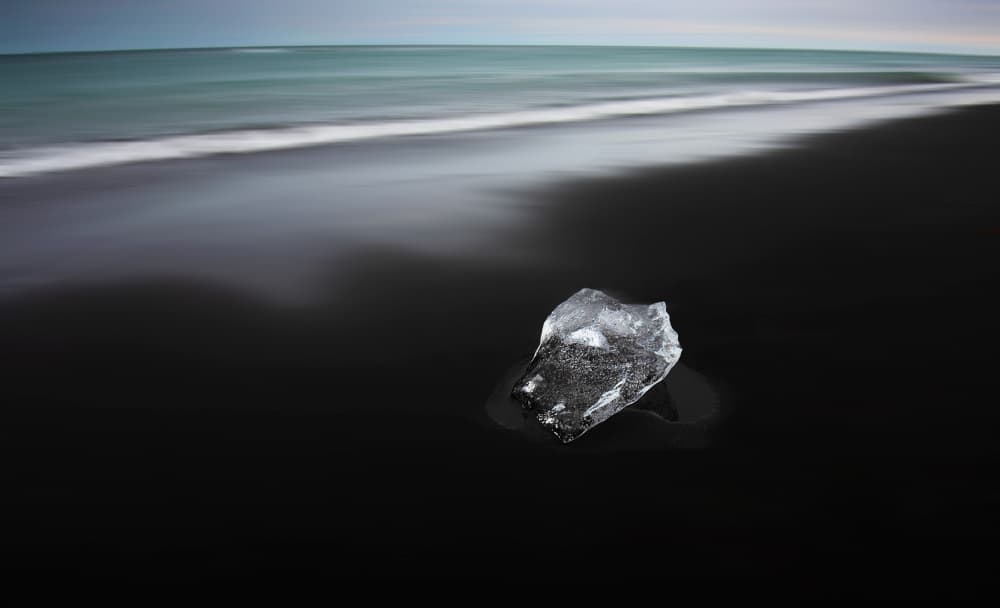 Ice on Black Sand by Erik Engström — canvas wall art