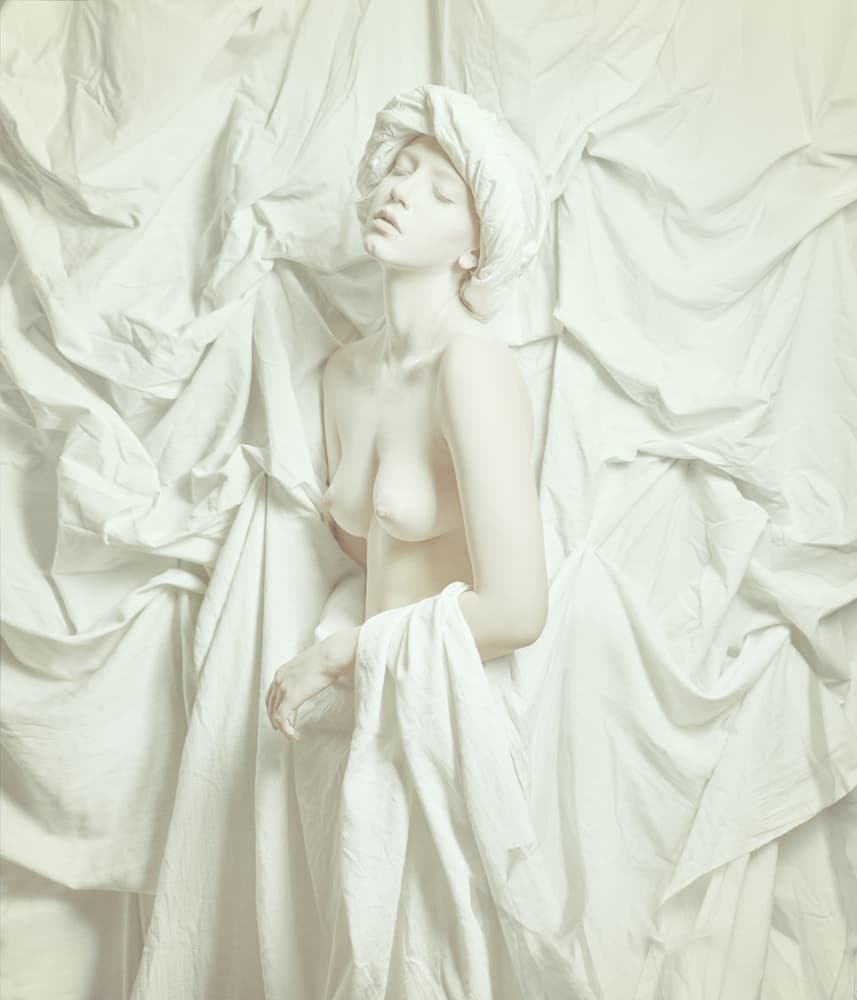 Serene Woman in White by Yuri Shevchenko — canvas wall art