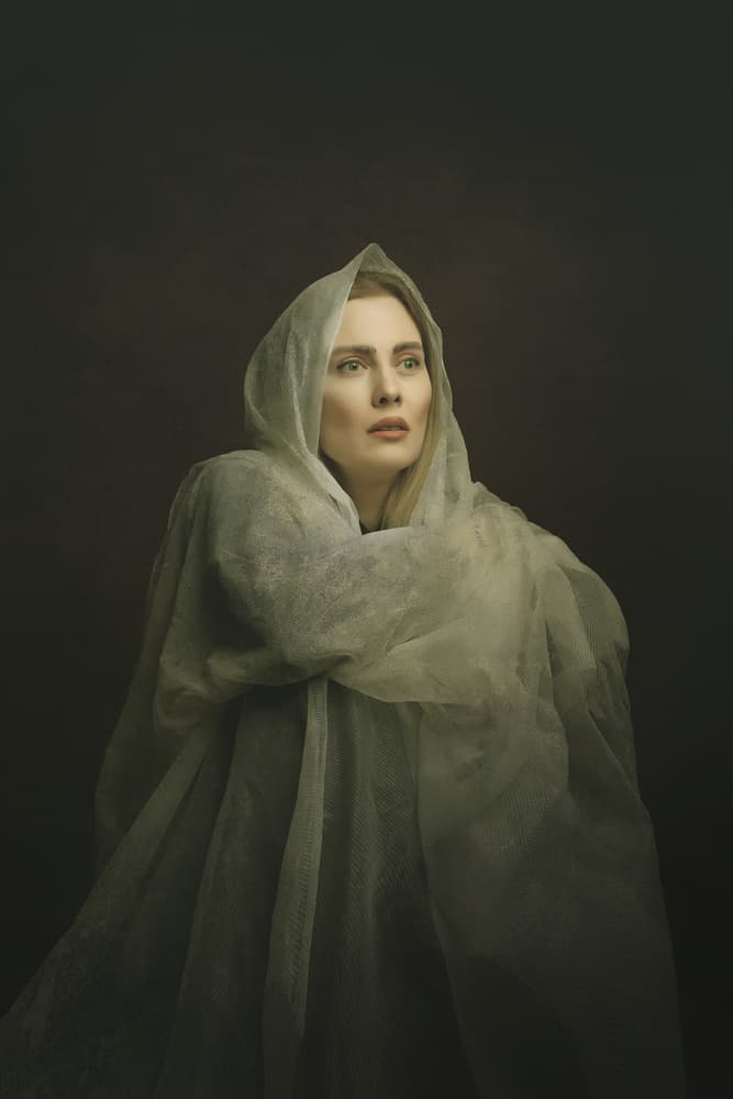 Serene Veiled Woman by Moein Hasheminasab — canvas wall art