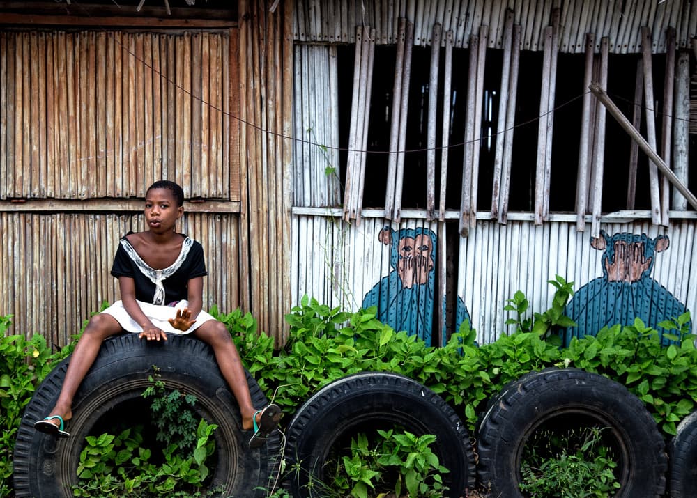 Young Girl on Tire by Lorenzo Grifantini — canvas wall art