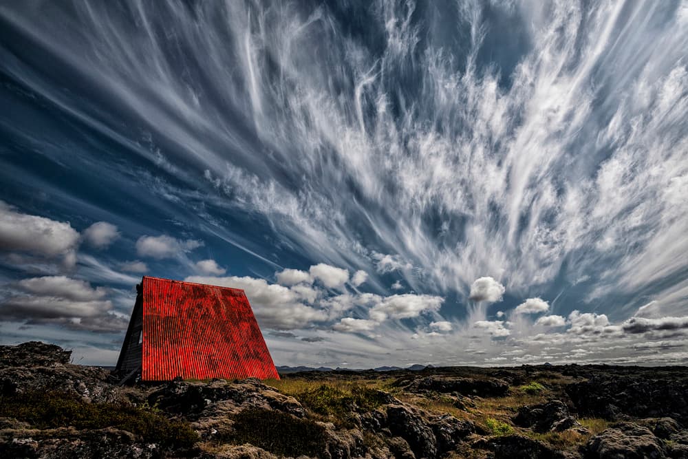 Isolated Red Hut by Þorsteinn H. Ingibergsson — canvas wall art