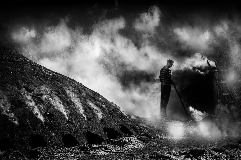 Charcoal Worker In Smoke by Adela Lia Rusu — canvas wall art
