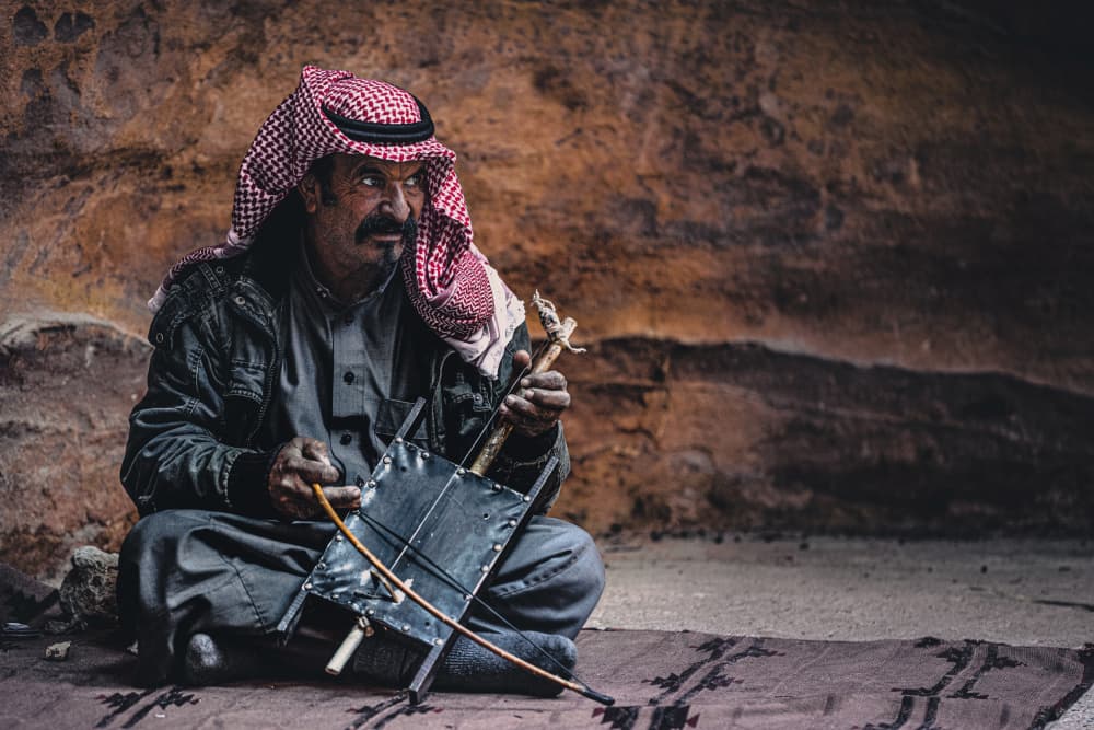 Desert Folk Musician by Marco Tagliarino — canvas wall art