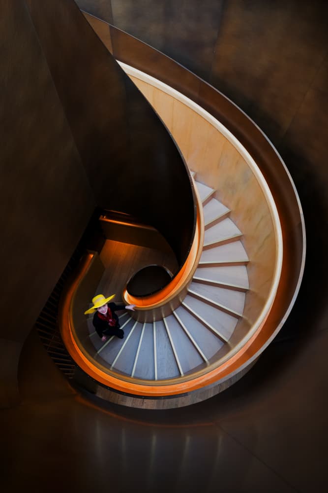 Yellow Hat Spiral Stairs by konglingming — canvas wall art