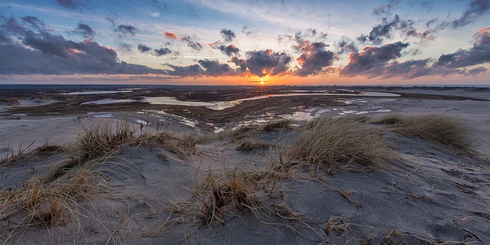 Sunset Over Sandy Dunes by Leif Løndal — canvas wall art