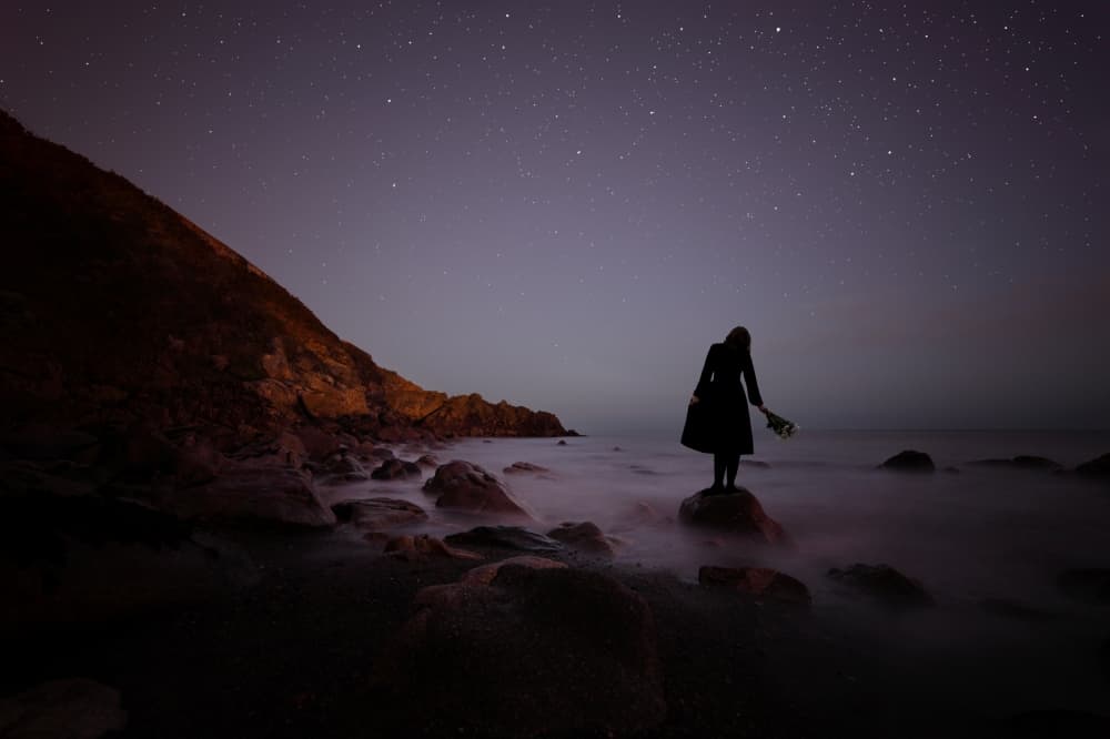 Lone Woman Starry Night by Martin Marcisovsky — canvas wall art