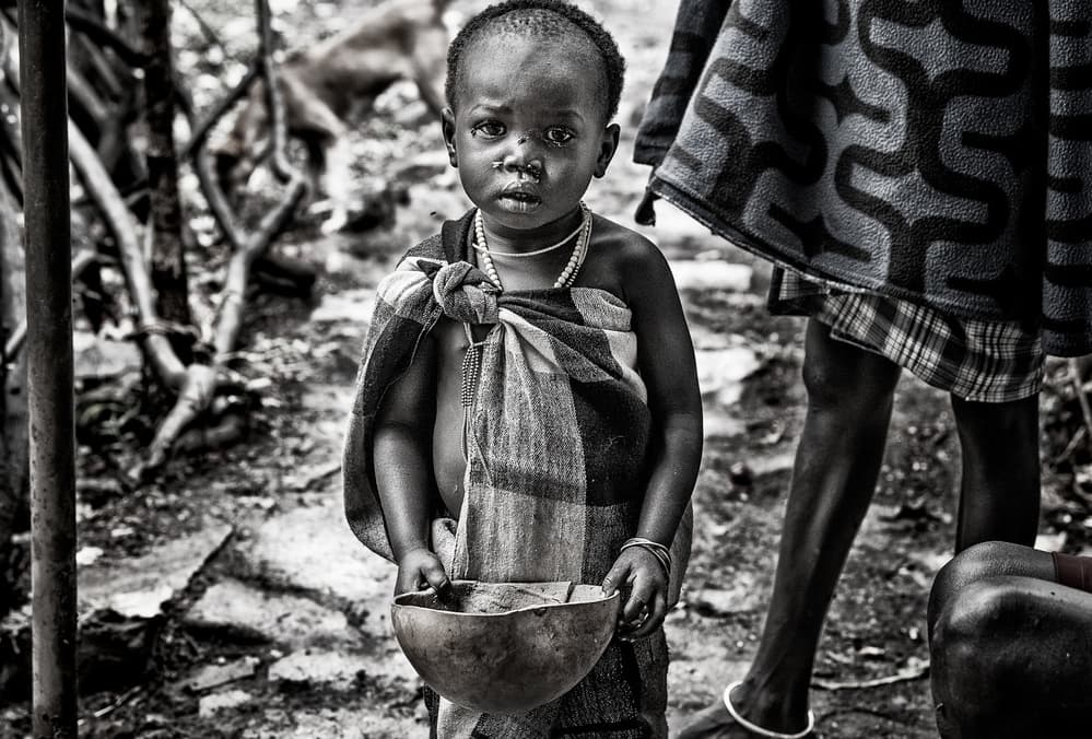 Solemn African Child by Joxe Inazio Kuesta Garmendia — canvas wall art