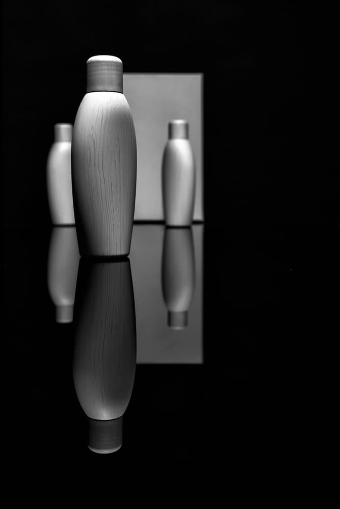 Sleek Bottles Reflection by Burghard Nitzschmann — canvas wall art