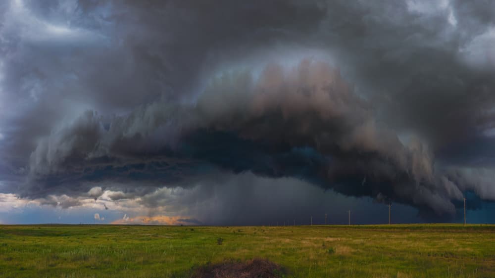 Rolling Storm Over Field by Jun Zuo — canvas wall art