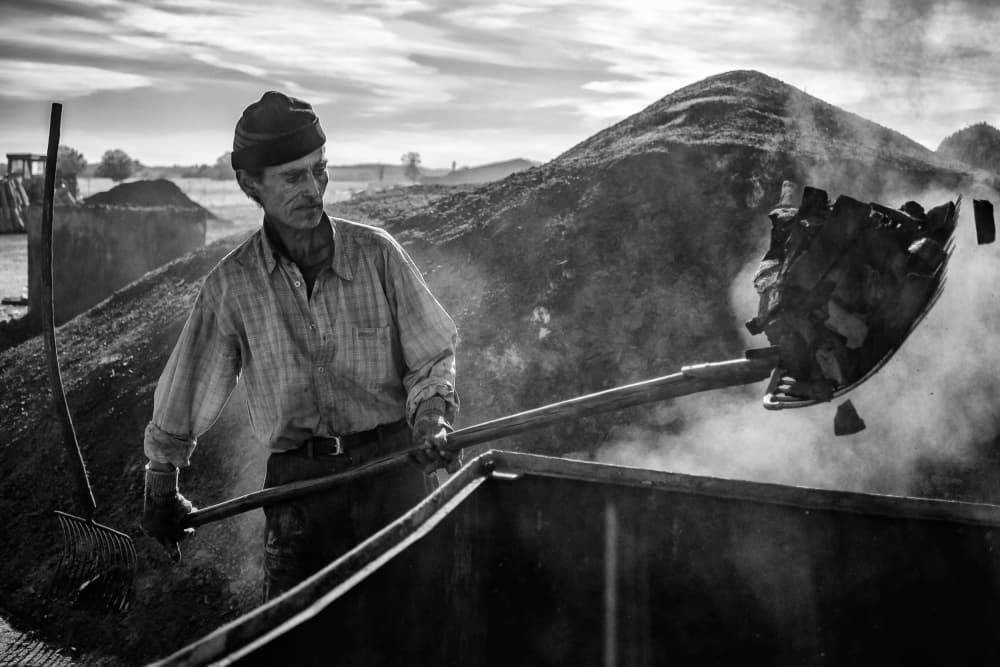 Man Shoveling Coal by Zoran Toldi (EFIAP AZSF) — canvas wall art