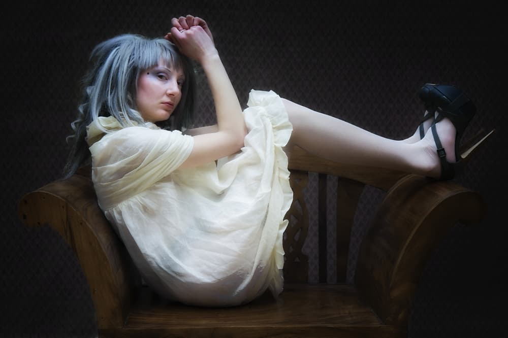Pensive Woman Reclining by kenp — canvas wall art