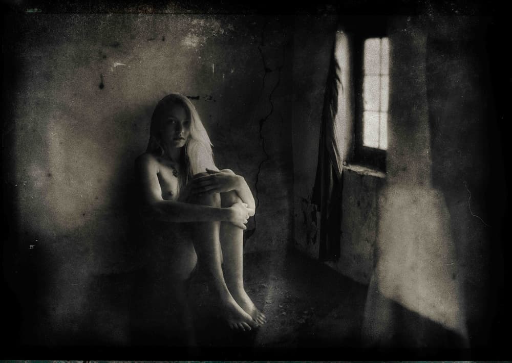 Pensive Woman Dark Room by Charlaine Gerber — canvas wall art
