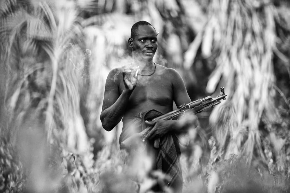 Jungle Warrior Smoking by Goran Jovic — canvas wall art