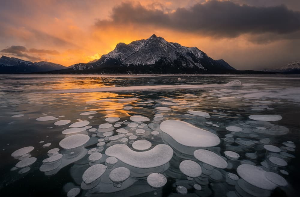 Golden Sunset Frozen Lake by Lydia Jacobs — canvas wall art