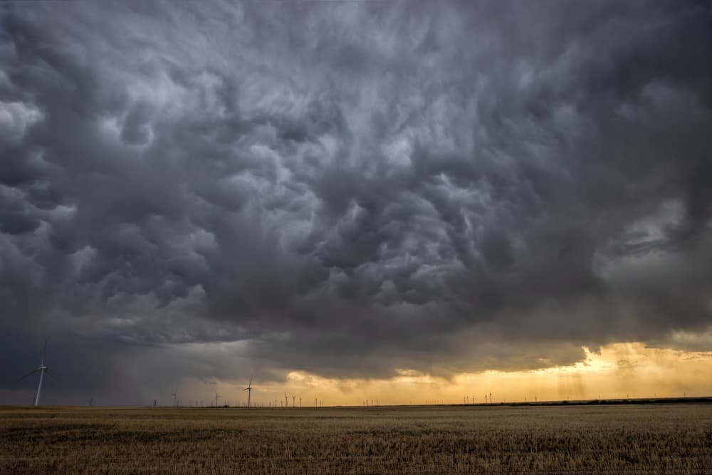 Dramatic Golden Storm Clouds by Jun Zuo — canvas wall art