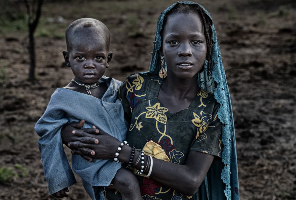 African Mother and Child by Joxe Inazio Kuesta Garmendia — canvas wall art
