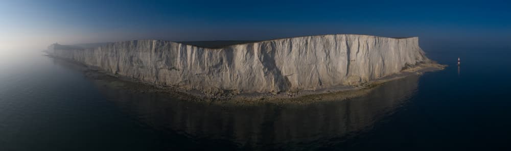 White Cliffs Over Calm Sea by Radojica Jevric fotorax — canvas wall art