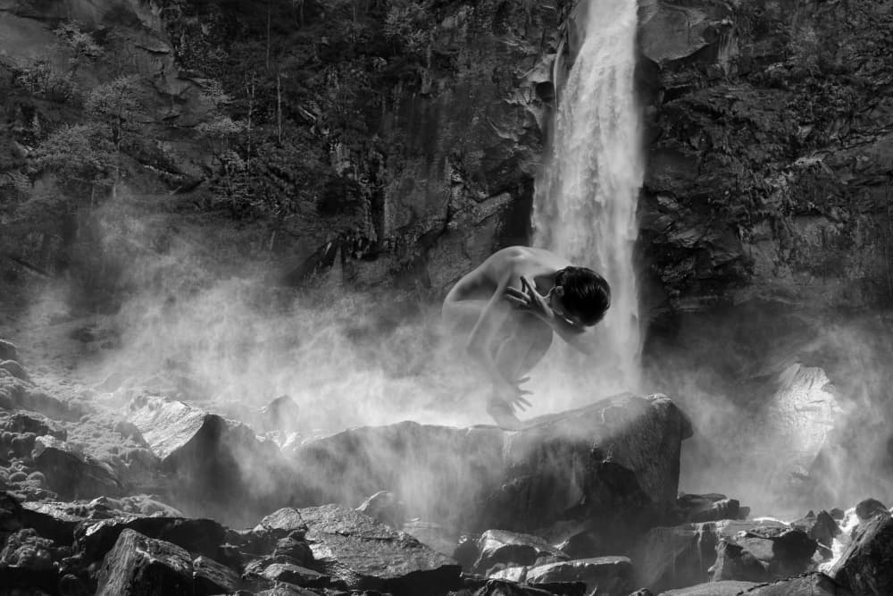 Man In Waterfall Mist by Angéla Vicedomini — canvas wall art