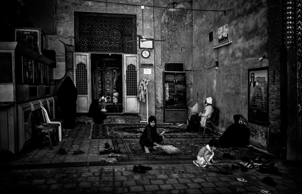 Historic Courtyard Life by Joxe Inazio Kuesta Garmendia — canvas wall art