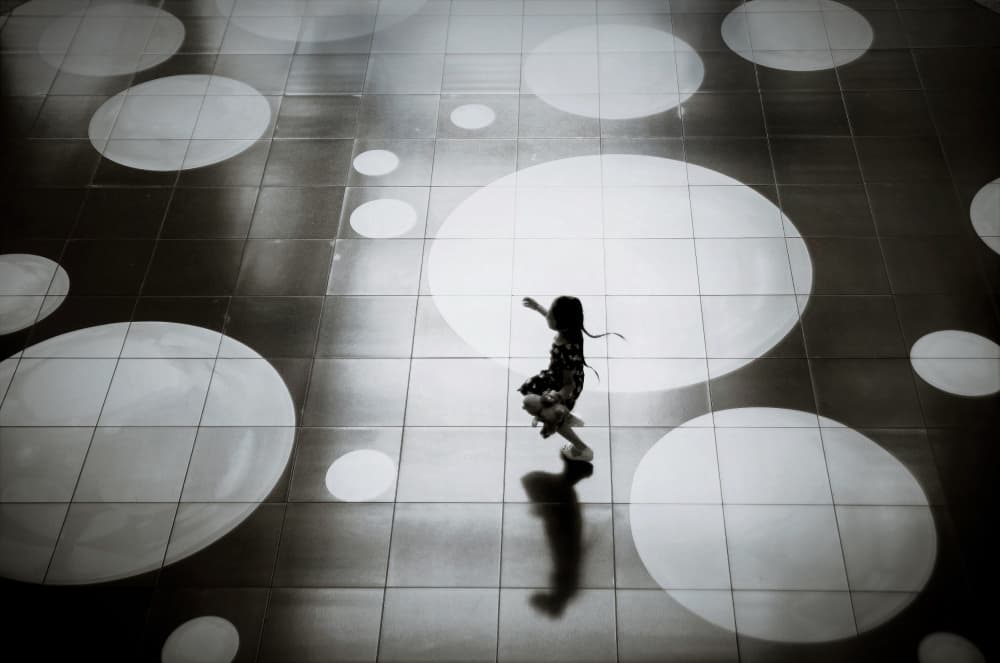 Dancing Child Circles by Reiko kiri — canvas wall art