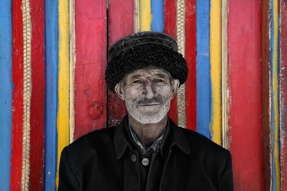 Man Against Vibrant Stripes by BJ Yang — canvas wall art