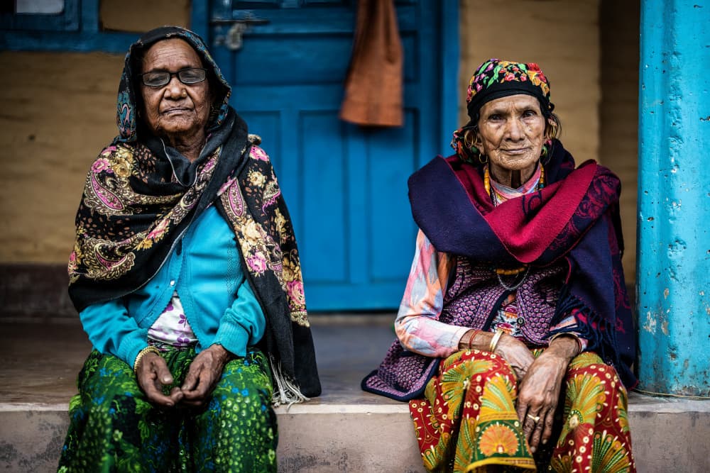 Colorful Village Elders by Adrian — canvas wall art