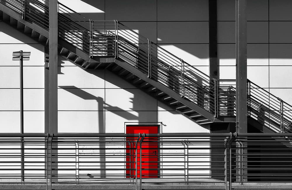 Red Door Ascent by Arnon Orbach — canvas wall art