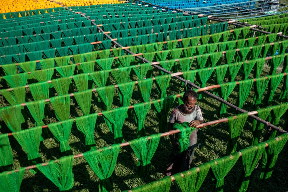 Man Among Green Yarns by Azim Khan Ronnie — canvas wall art
