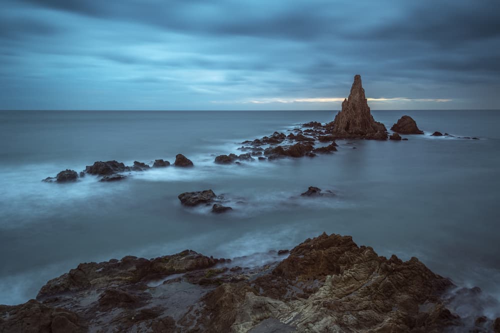Dramatic Sea Stack by Manuel Jose Guillen Abad — canvas wall art