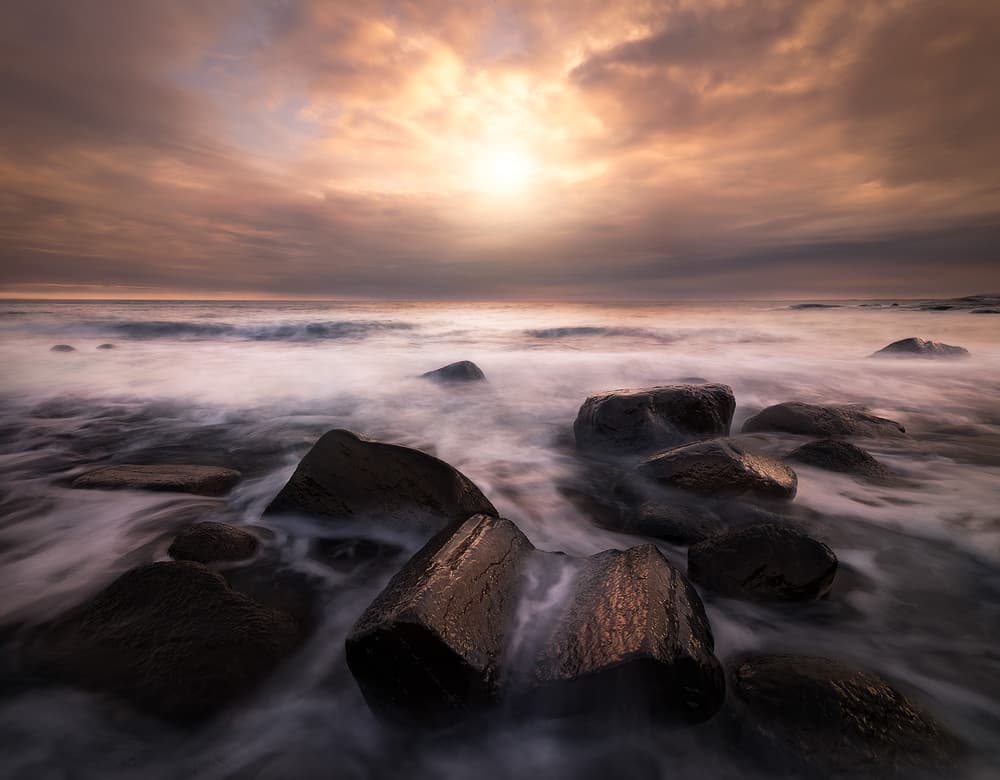 Misty Coastal Sunset by Christian Lindsten — canvas wall art