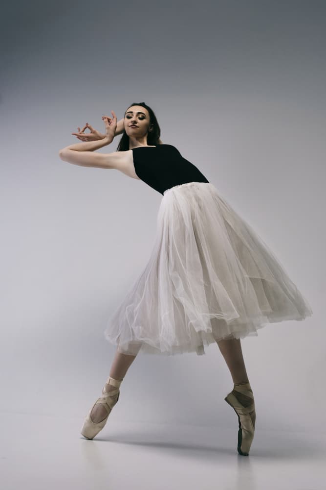 The courage. a young ballerina in a black skirt and Chopin is standing on pointe shoes by Alexandr — canvas wall art