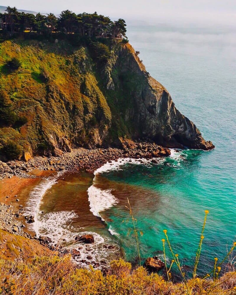 Turquoise Cove Cliffside by Del Mundo Imagery — canvas wall art