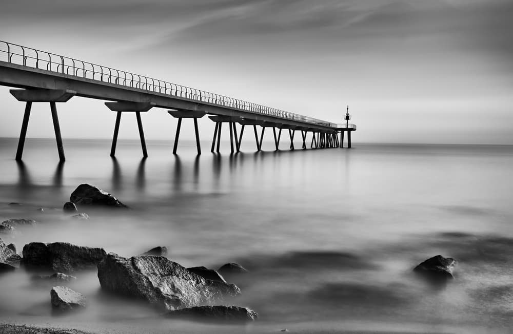 Monochrome Ocean Pier by Antoni Figueras — canvas wall art