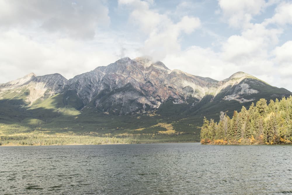 Serene Mountain Lake Vista by Lynann Colligan — canvas wall art