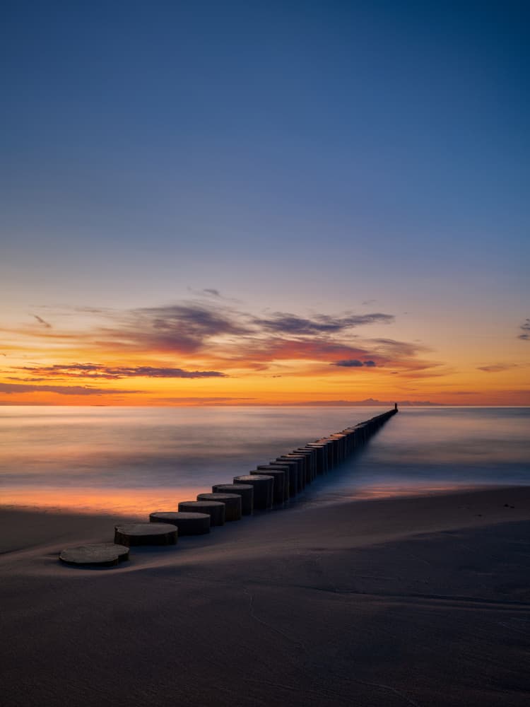 Serene Beach Sunset by Radek Pohnan — canvas wall art