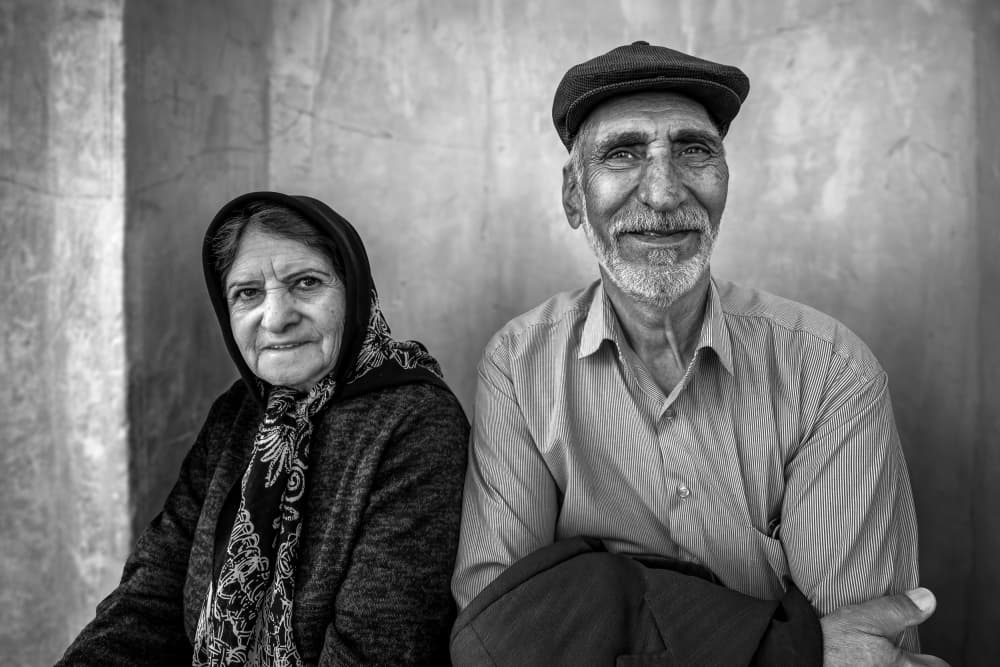 Elderly Couple's Warm Smile by Irene Wu — canvas wall art
