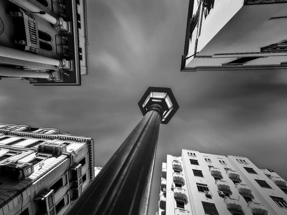 Lamppost Among Giants by Hesham Ragab — canvas wall art