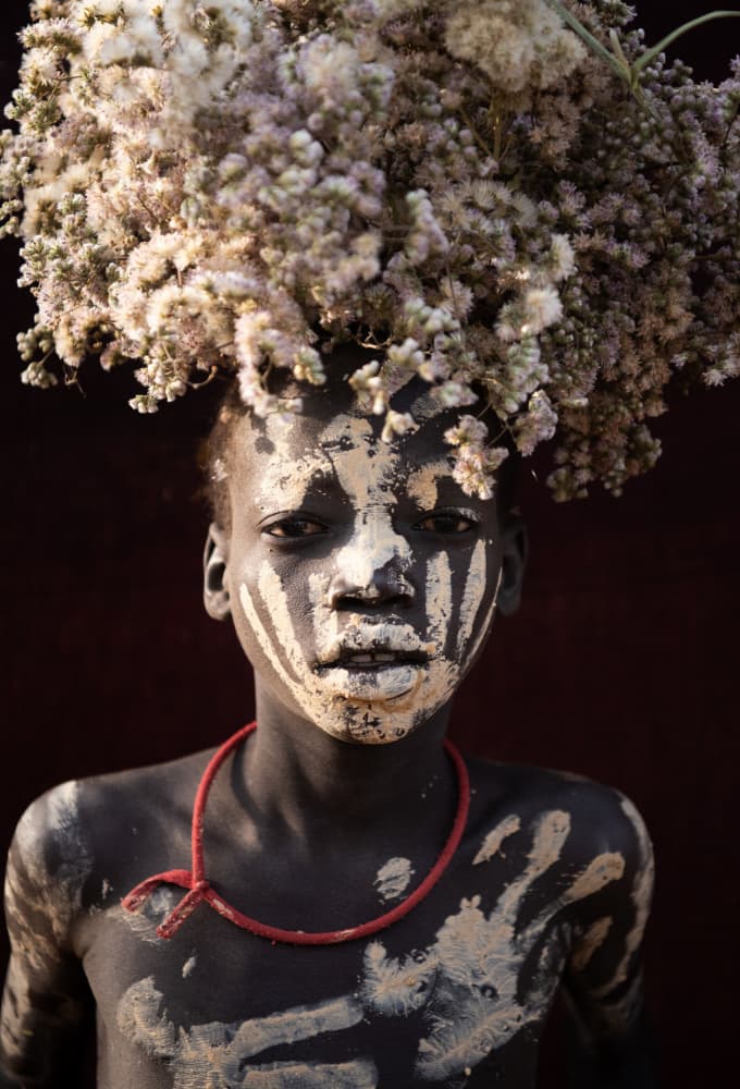 Tribal Child With Flowers by Max Vere-Hodge — canvas wall art