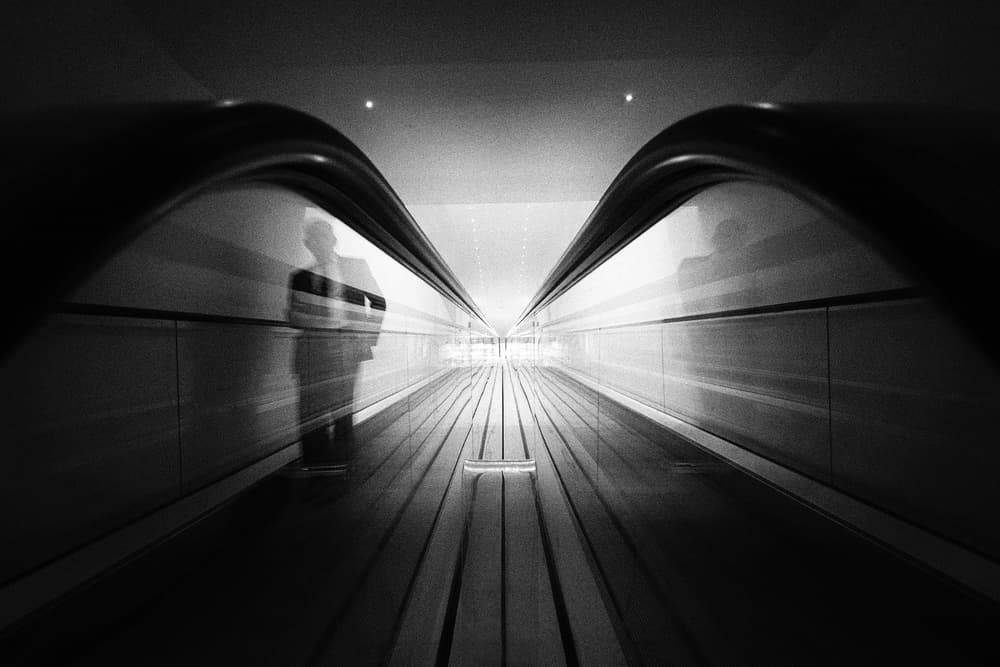 Moving Walkway Blur by Florentinus Joseph — canvas wall art