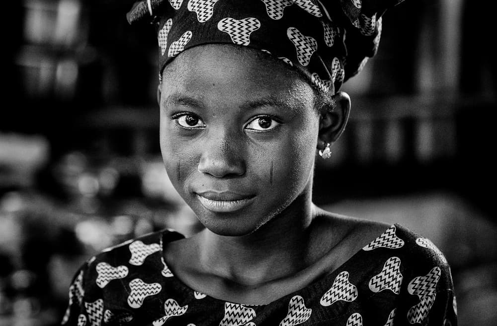 African Girl Portrait by Joxe Inazio Kuesta Garmendia — canvas wall art