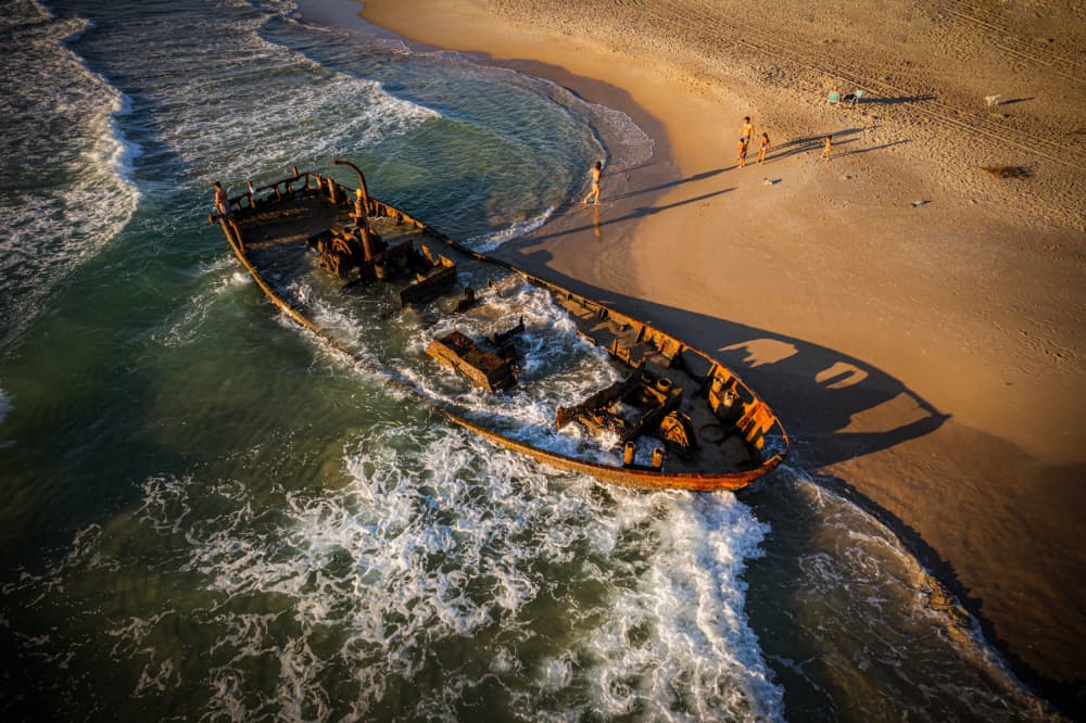 Golden Hour Shipwreck Beach by Isam Telhami — canvas wall art