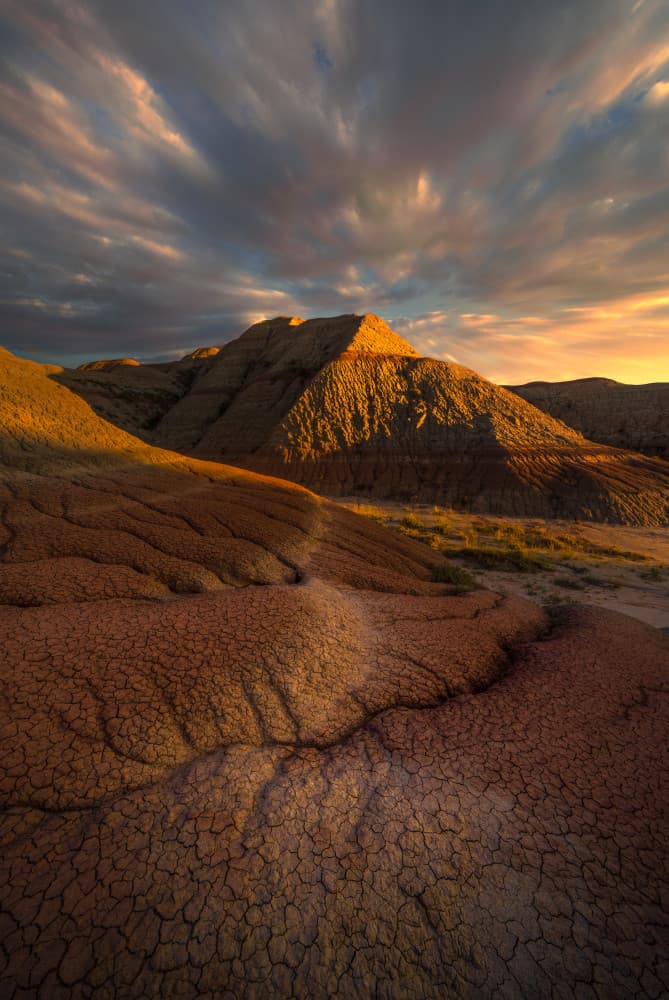 Golden Badlands Sunset by Ruiqing P. — canvas wall art