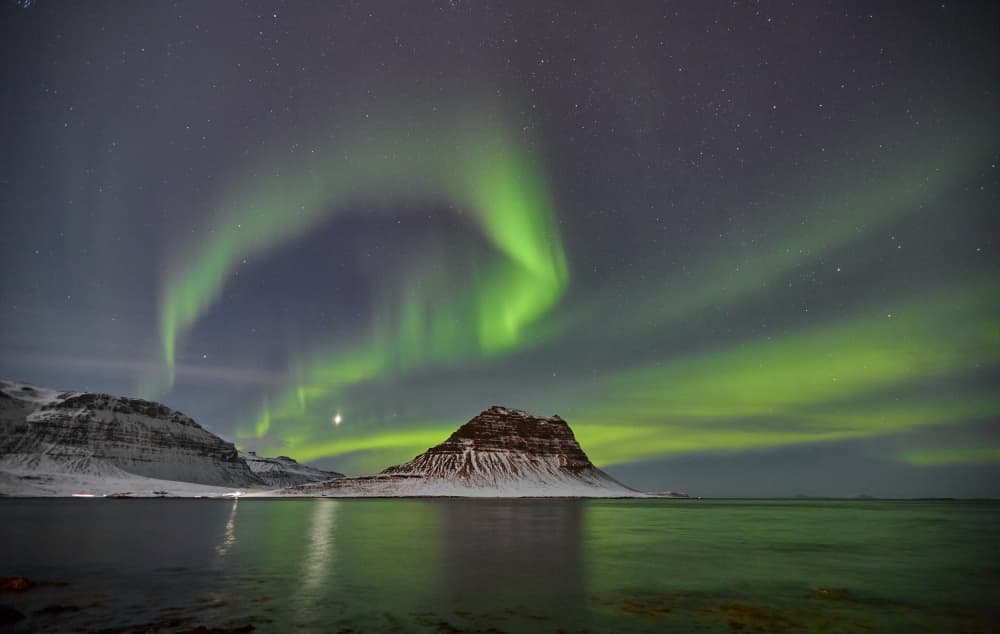 Northern Lights Mountain Reflection by Avital Hershkovitz — canvas wall art