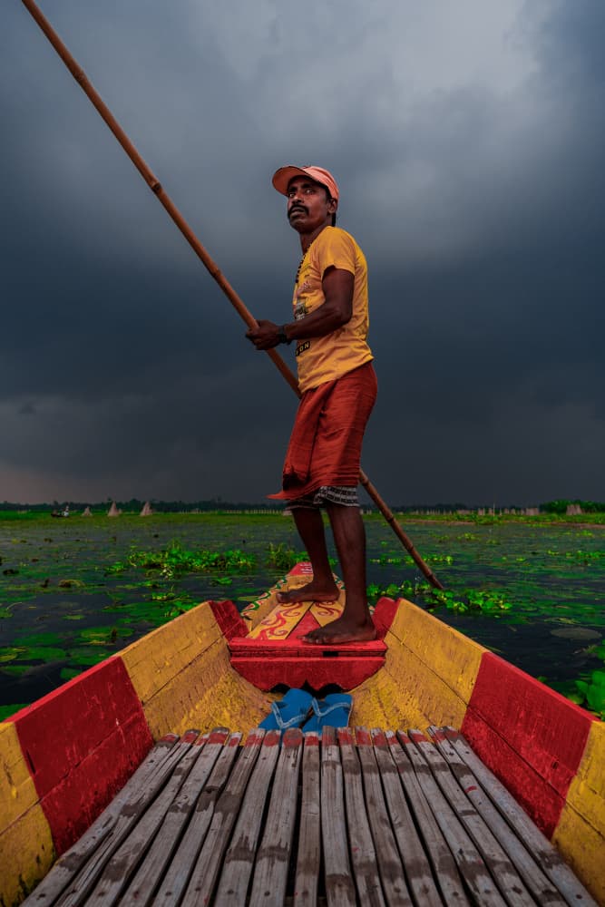Boatman Under Stormy Sky by Kuntal Biswas — canvas wall art