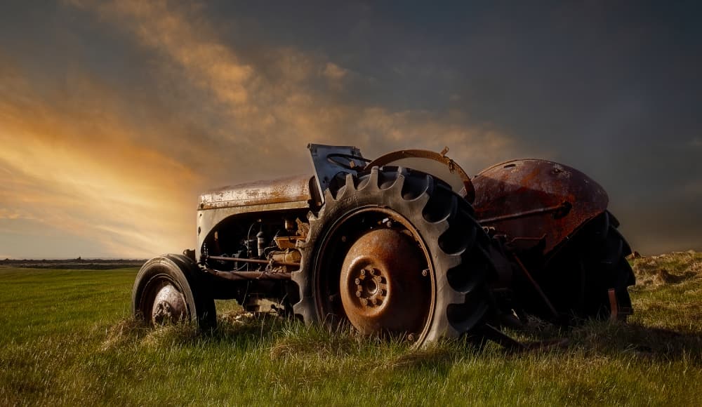Old Rusty Tractor Sunset by Wim Denijs — canvas wall art