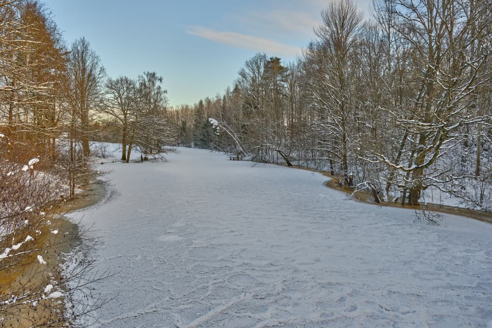Frozen Winter River by Geertjan Plooijer — canvas wall art