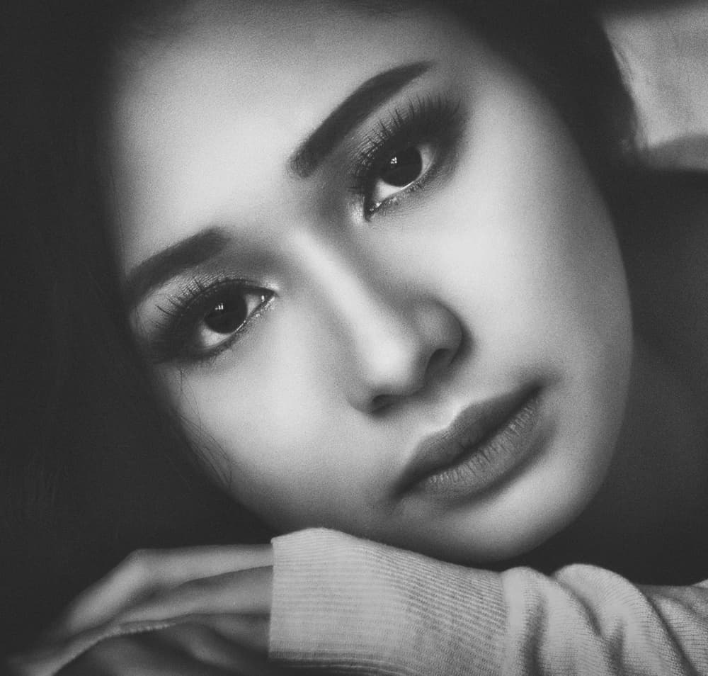 Thoughtful Woman's Gaze by Rooswandy Juniawan — canvas wall art