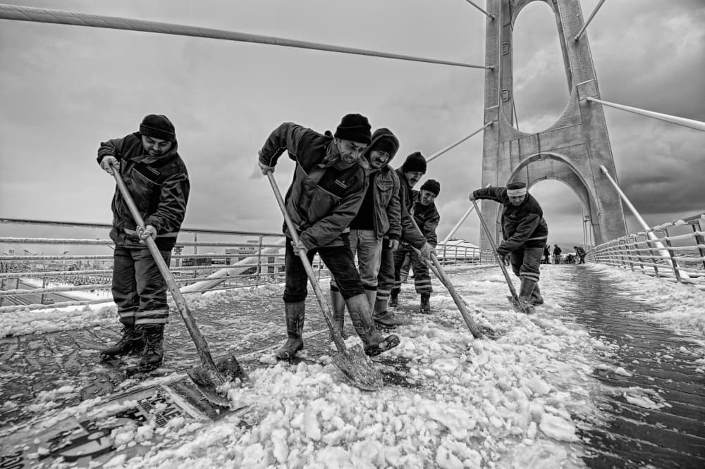 Workers Clear Icy Bridge by nebula — canvas wall art