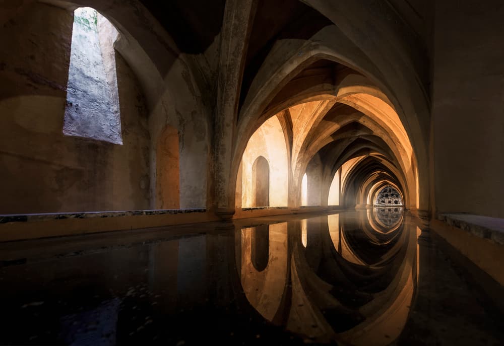 Arched Hallway Reflections by Jorge Ruiz Dueso — canvas wall art