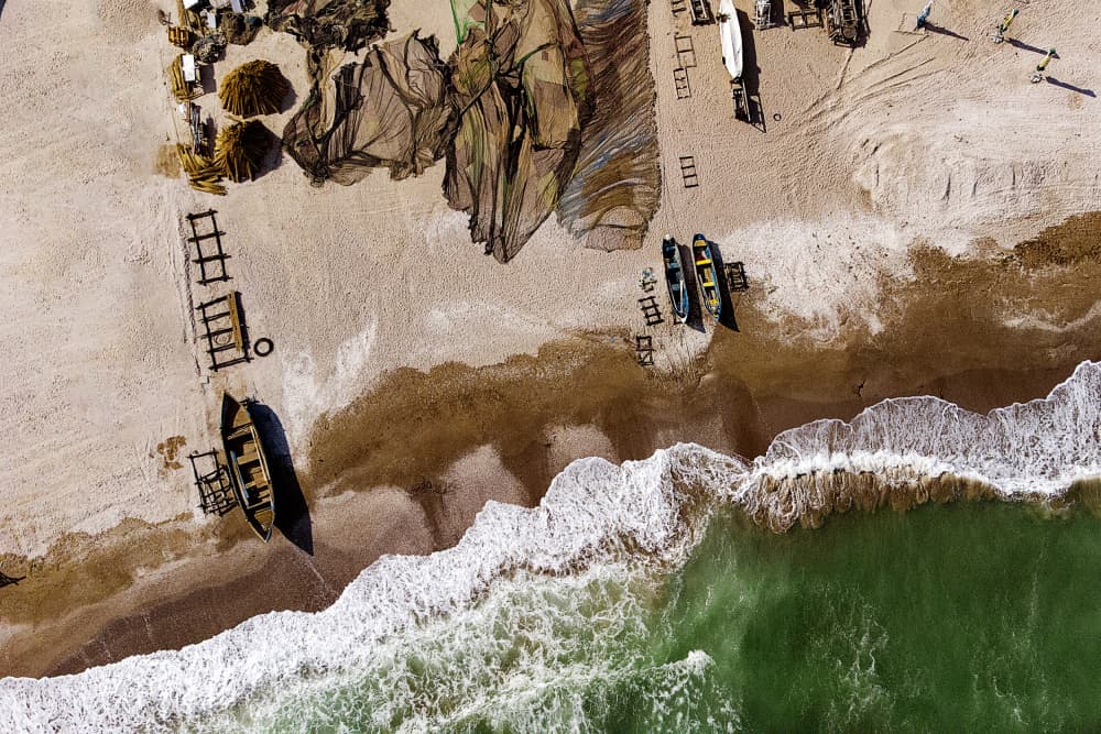 Beach Boats Overhead by Gina Buliga — canvas wall art